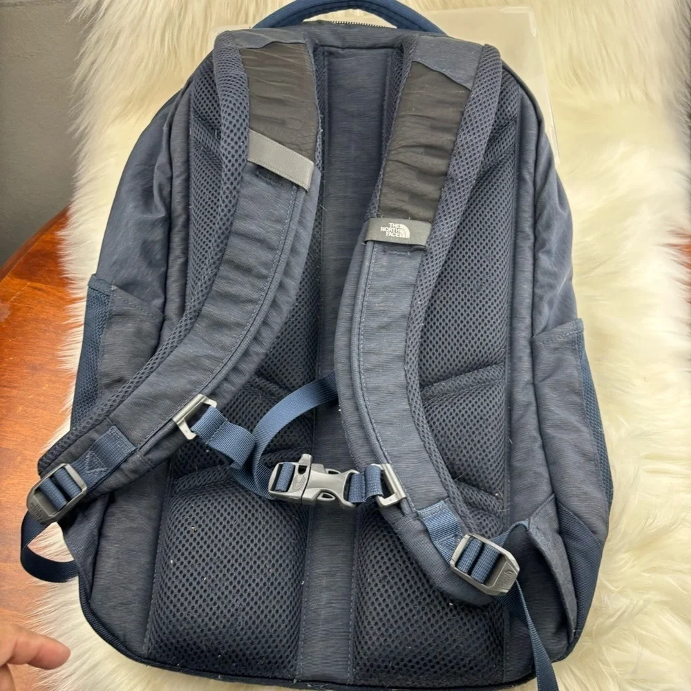 The North Face Blue Backpack with Durable Design and Versatile Functionality